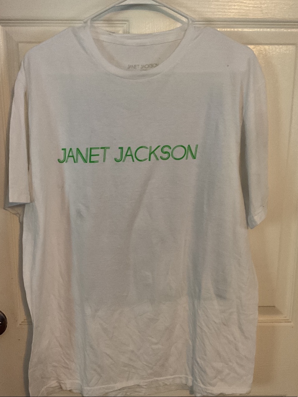White Short Sleeve Tee with Green 'JANET JACKSON' Logo with Backhit